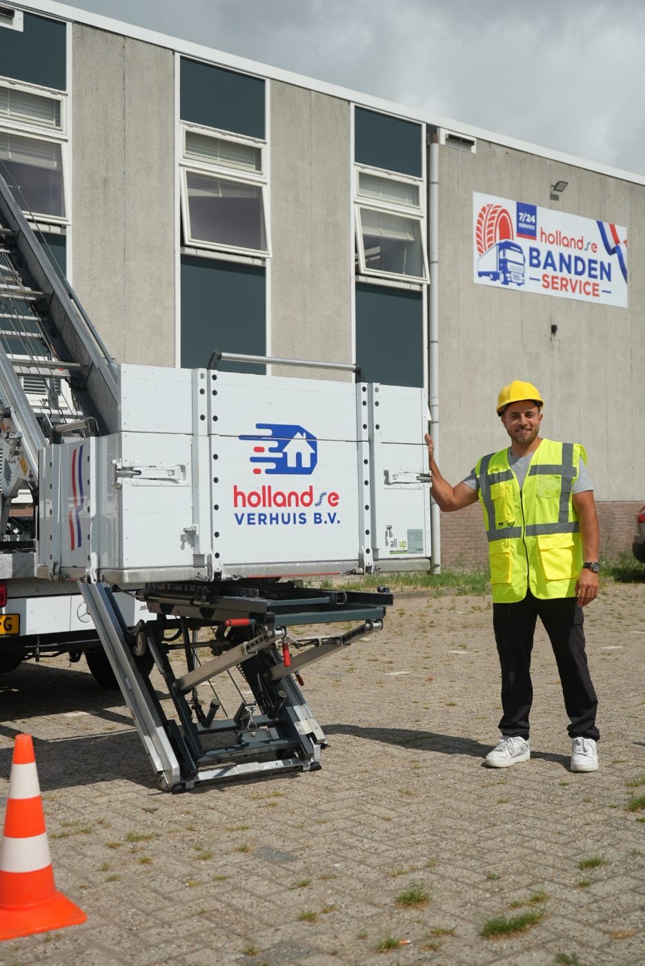 A mover operates the lift on a moving vehicle
